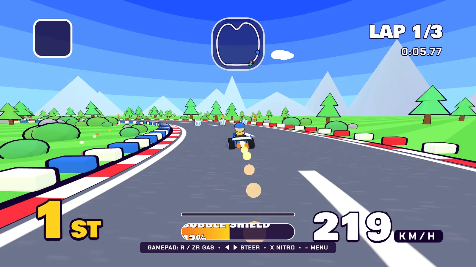 A Turbo Kartz kart on a wide grey road heading for a yellow and black jump ramp